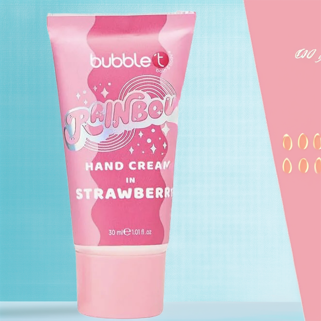 Pink tube of bubble t Rainbow Hand Cream in Strawberry on a light blue background