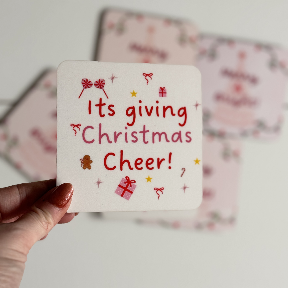 Coaster with its giving christmas cheer on it