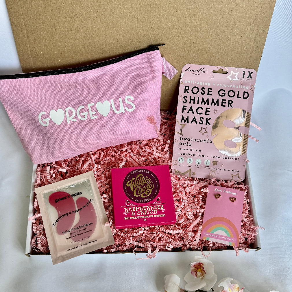 Gorgeous gift box for friends. A treatbox filled with a pouch, skincare and edible treats