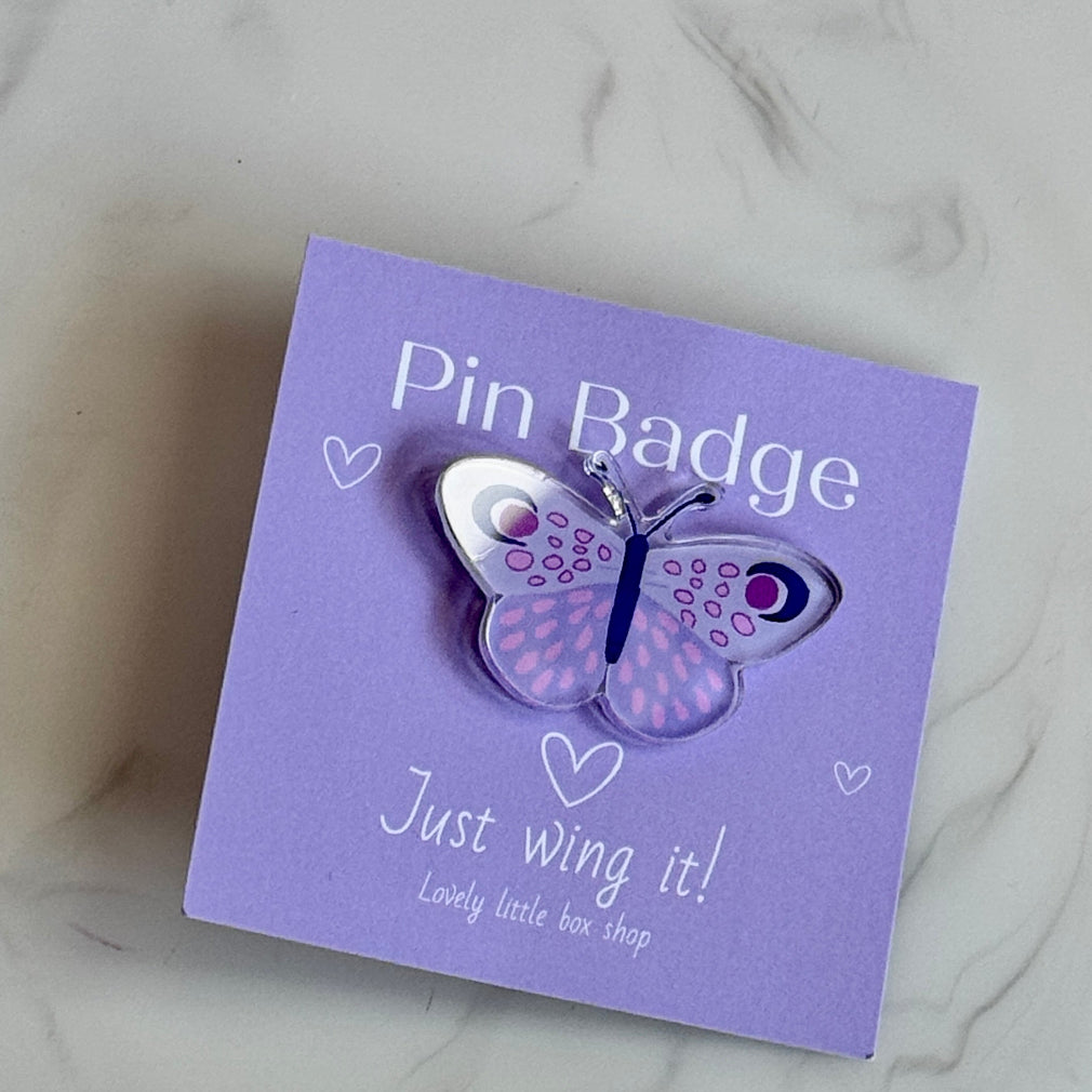 acrylic shades of purple Butterfly pin badge on a backing card