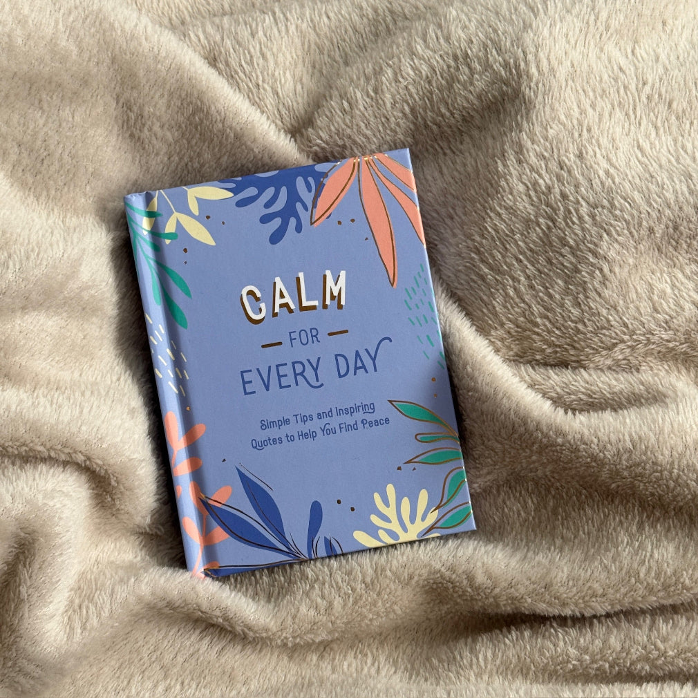 a small hardback book with tips and inspirational quotes - colour blue