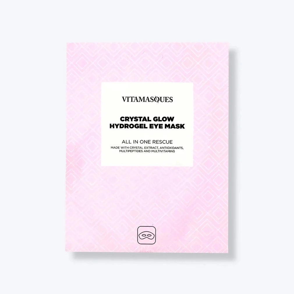 Vitamasques Crystal Glow Hydrogel Eye Mask packaging on a light pink background