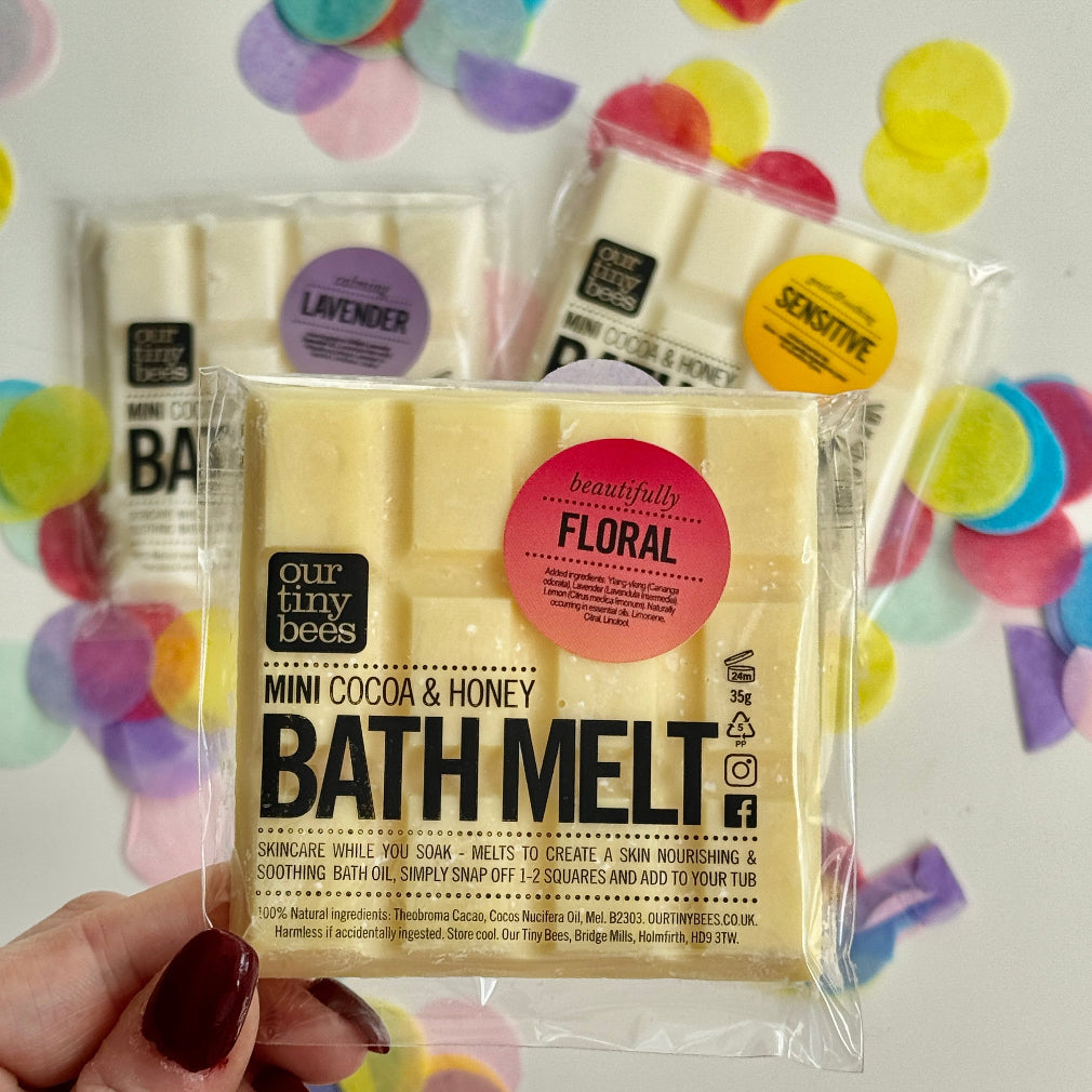 A artisanal bath melt made with coca & honey with a floral scent