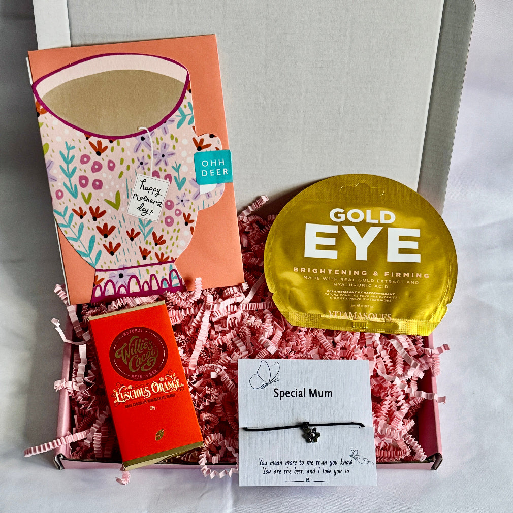 treatbox including skincare, edible treats and keepsakes with a mothers day themed note card