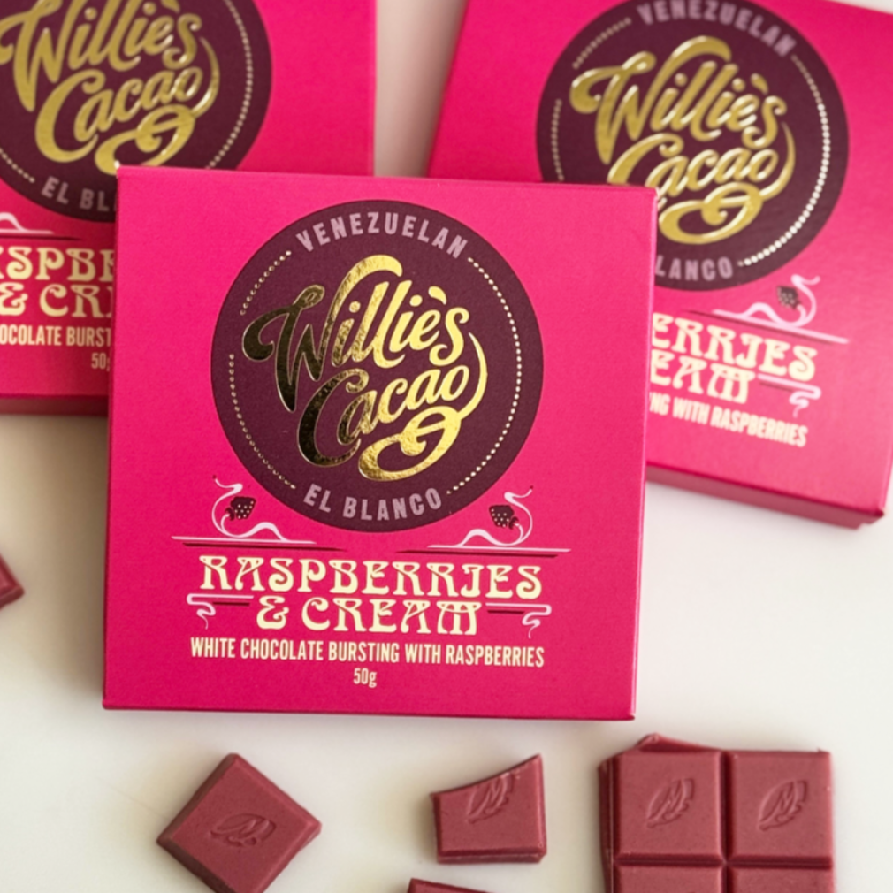 Willie's Cacao Raspberryjes & Cream chocolate bars and packaging on a white background