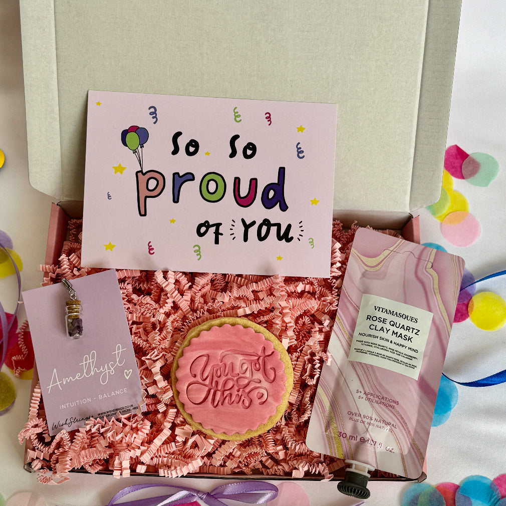 a mini treatbox with a keepsake, biscuit and facemask