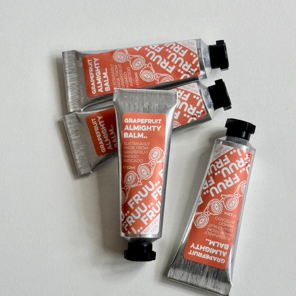 body and hand balm made from wonky fruit in a tube with a red/pink sticker