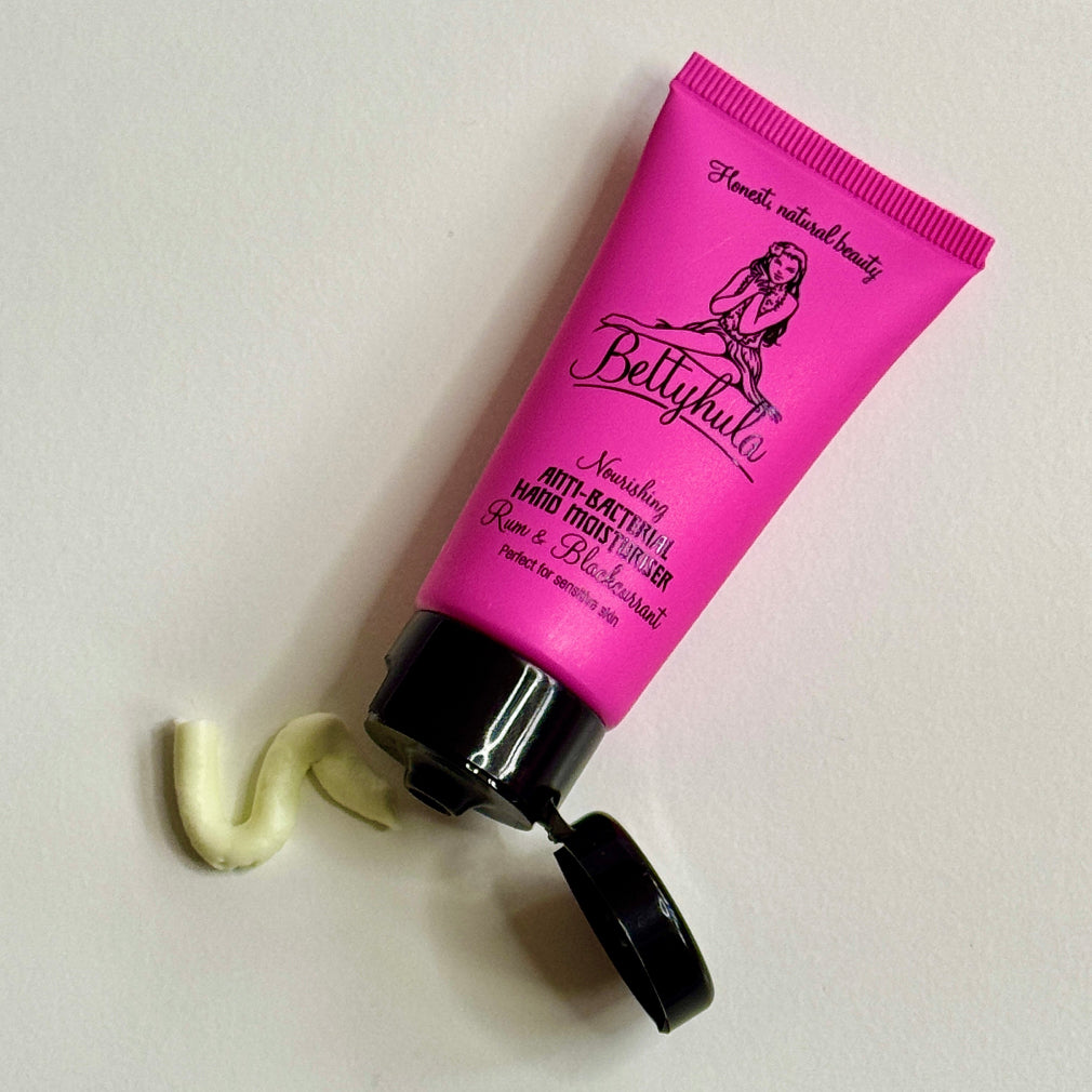 rum & blackcurrant hand cream in a pink tube