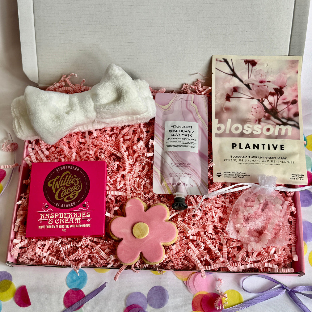 treatbox including skincare, edible treats and keepsakes with a themed note card