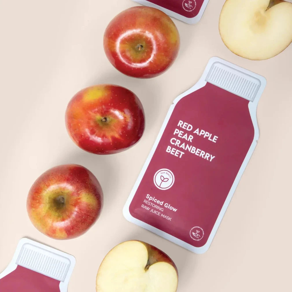 Red apple pear cranberry beet mask packaging with apples on a beige background